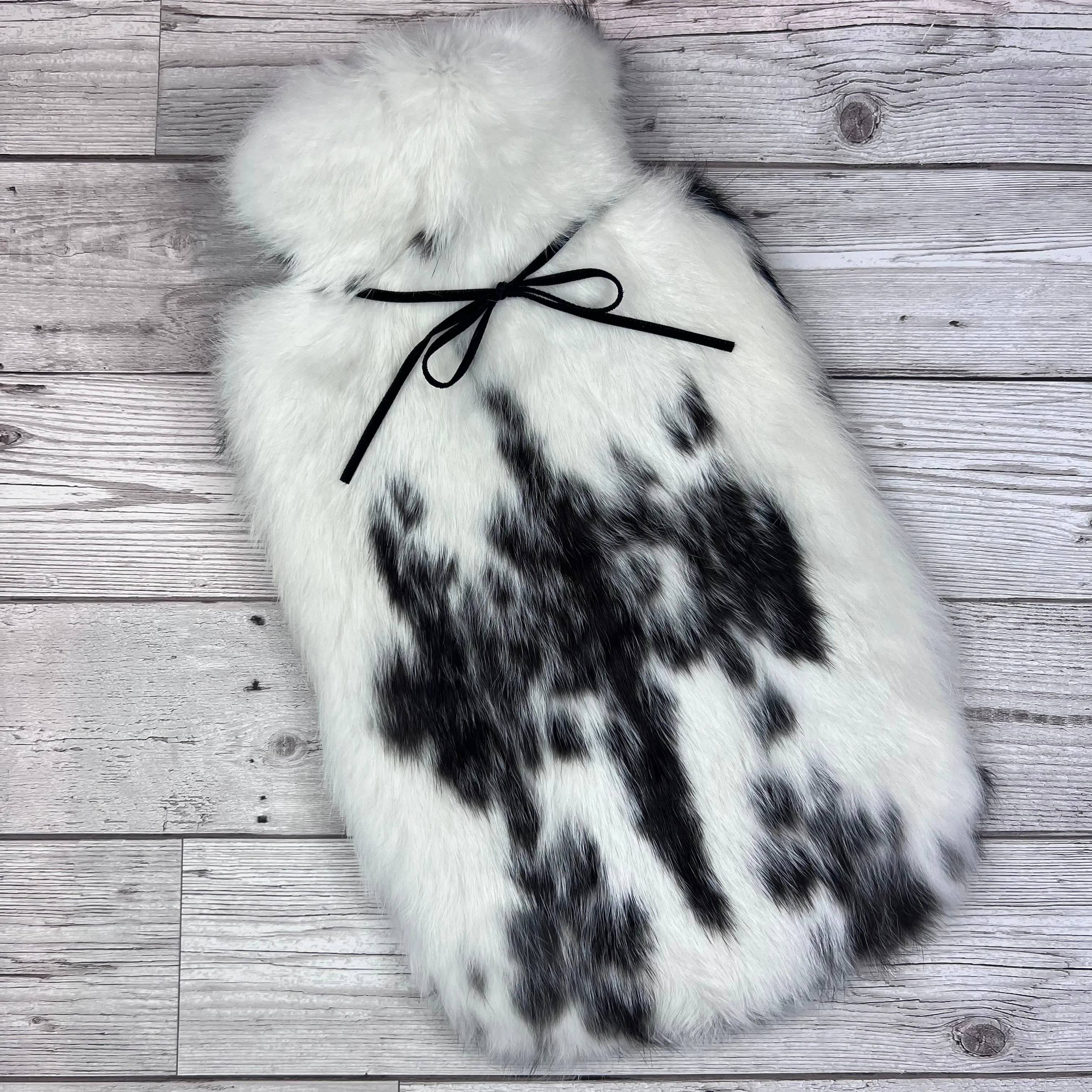 Nothing says I love you like a warm hug! Real Fur Hot Water Bottle | £175