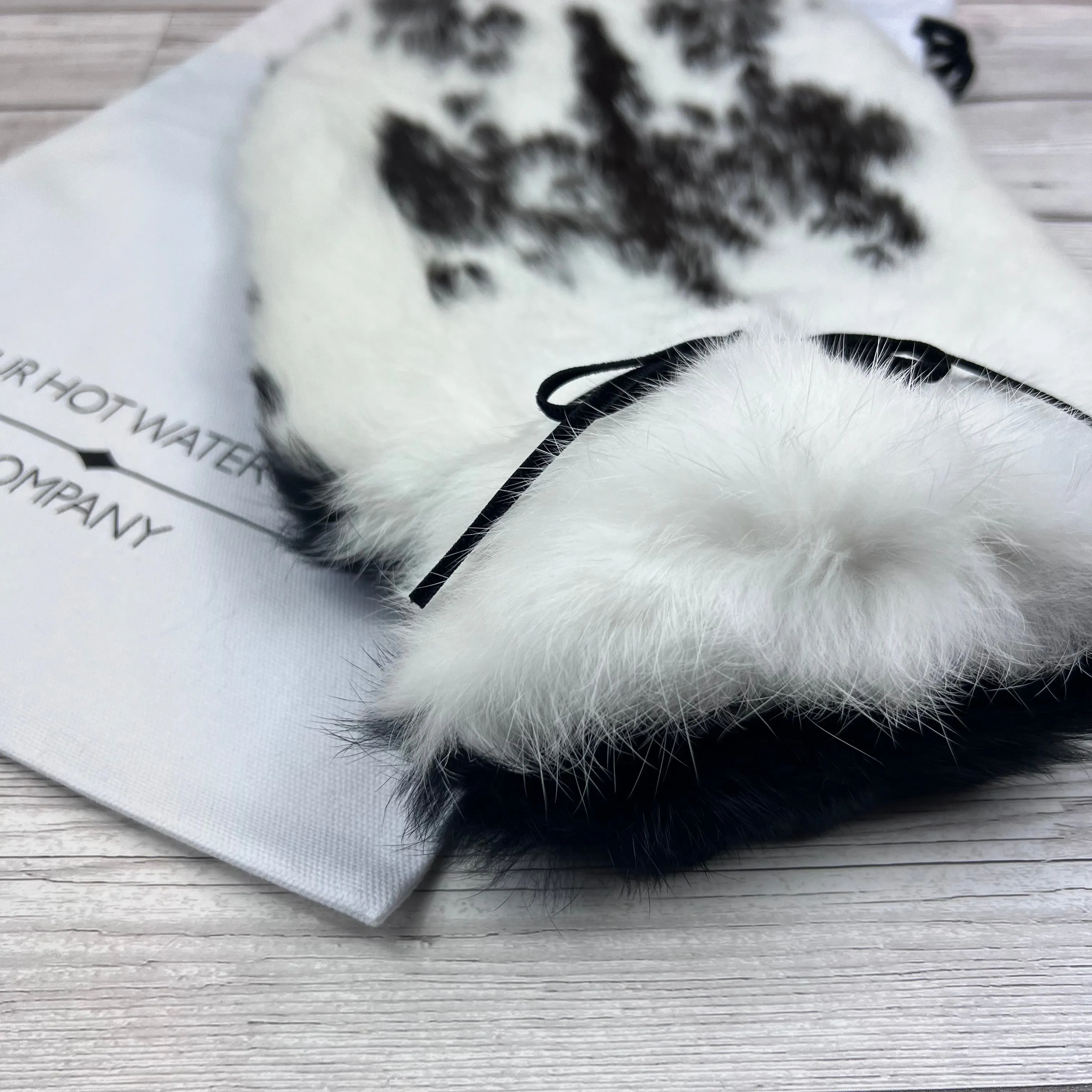 Nothing says I love you like a warm hug! Real Fur Hot Water Bottle | £175